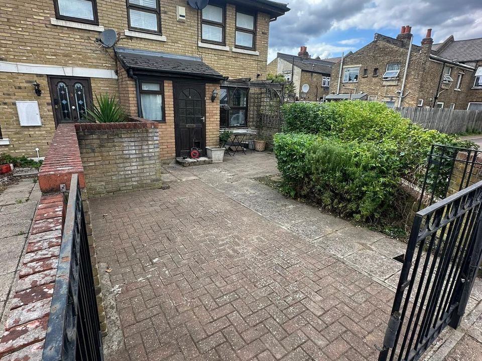 Paved terrace with planters