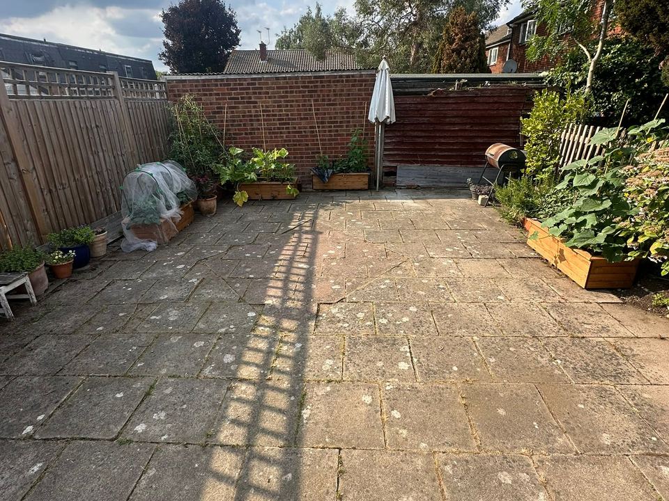 Brick garden entrance and hedge