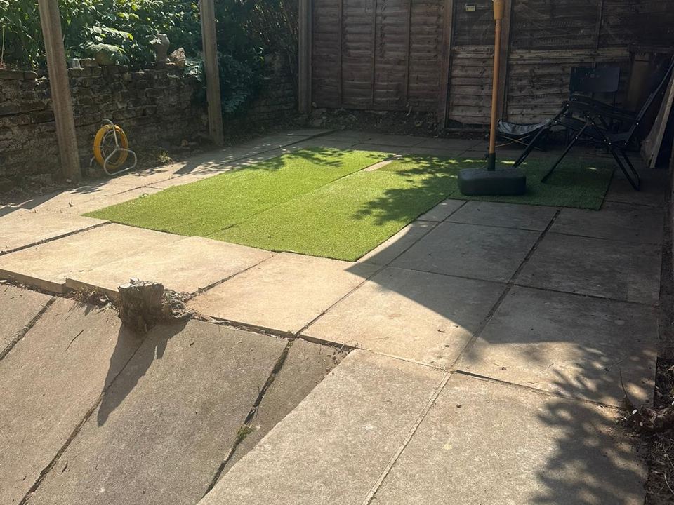 New lawn and paved seating area